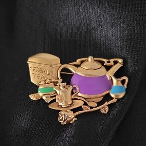 Elegant Gold Tea Set Brooch with Purple and Green Accents
